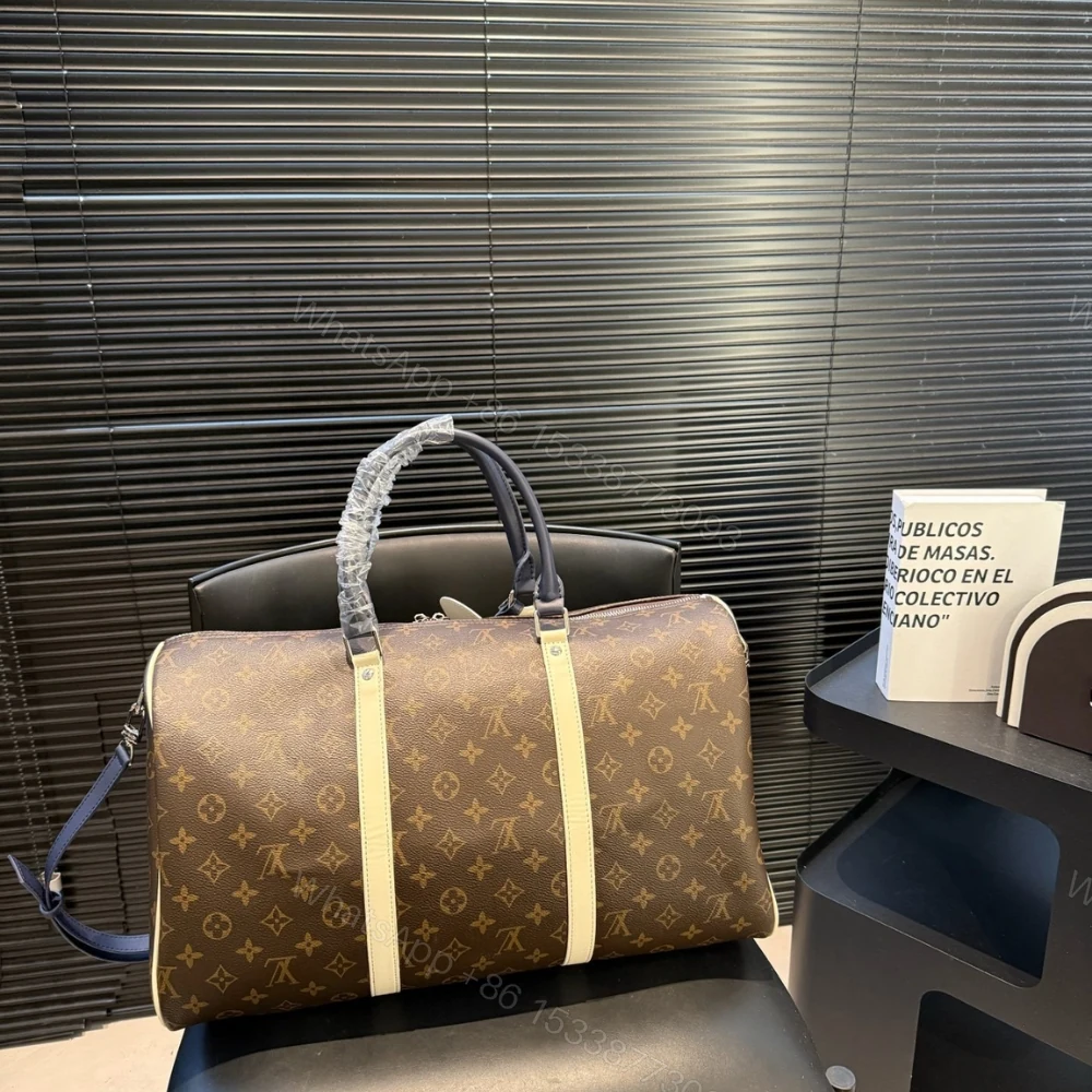 View 4 of Louis Vuitton Keepall Bandoulière 50 Monogram Canvas Light Yellow 45cm