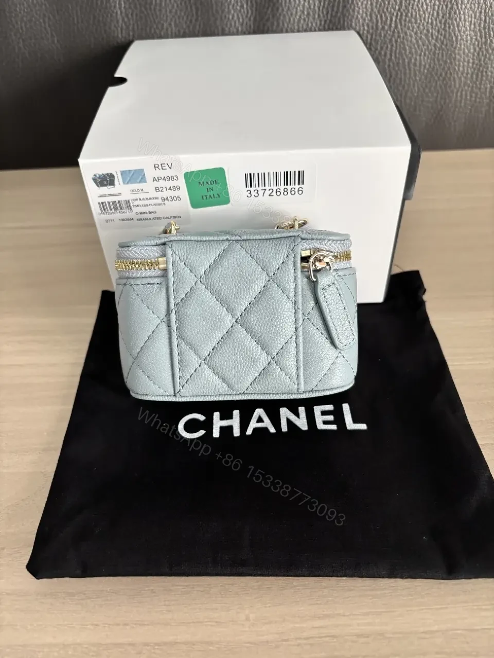 View 8 of Blue-Gray Quilted Leather Shoulder Bag with Chain Strap, Compact Luxury