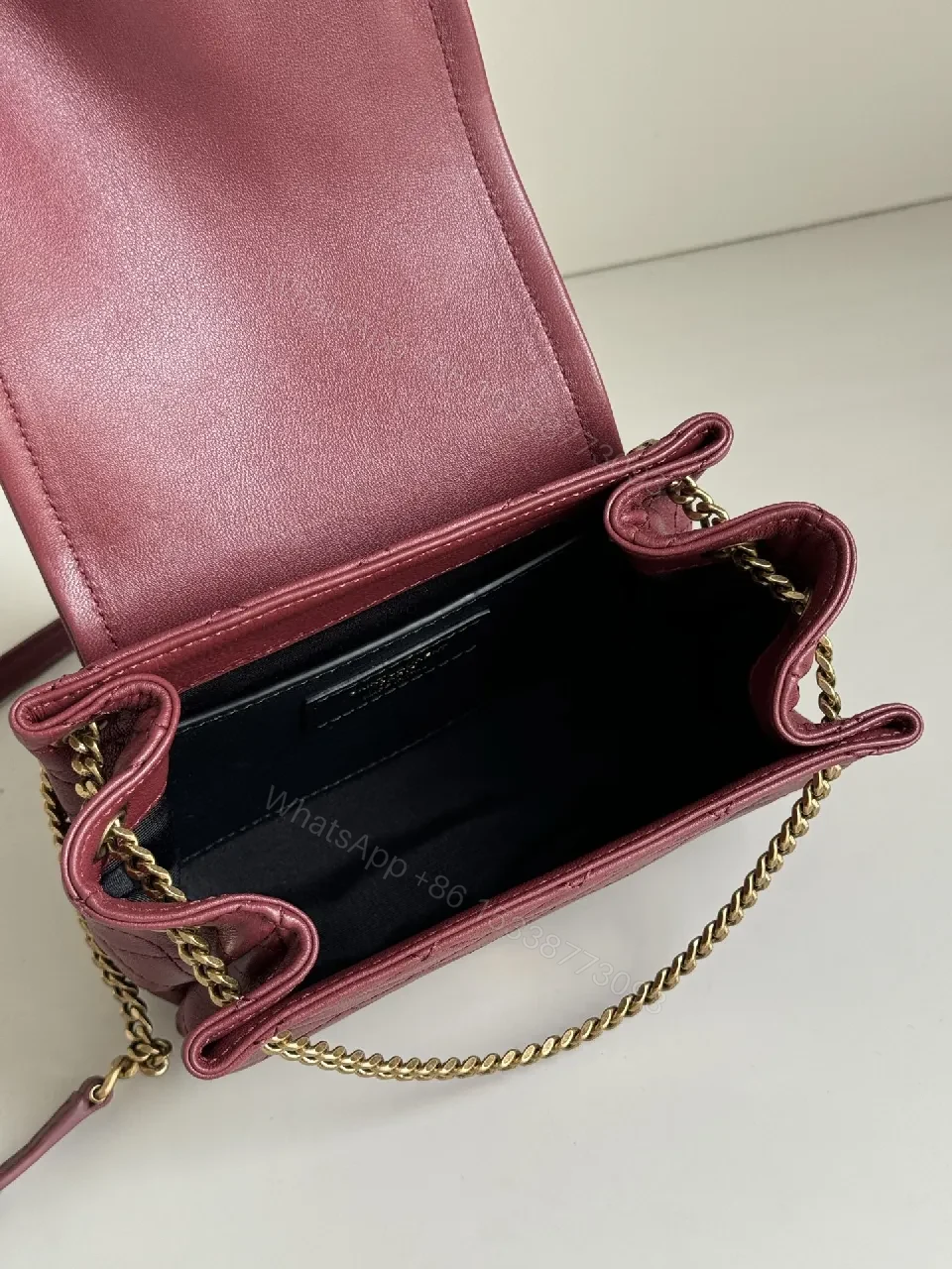 View 2 of Richly Textured Burgundy Leather Bag, Compact, Quilted Crossbody