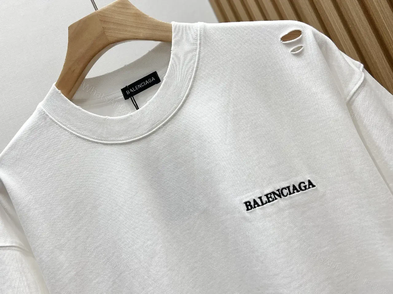 View 3 of White Cotton Minimalist Logo Tee with Subtle Hardware Details