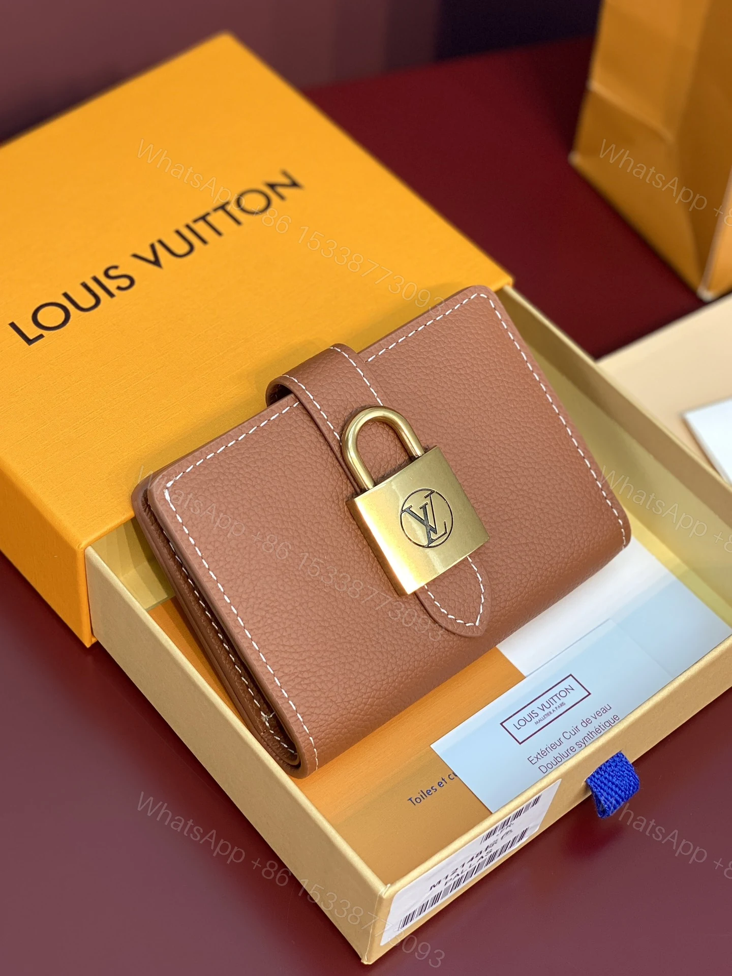 LV高仿Portefeuille Locky棕色短夾 經典鎖頭設計 百搭壓紋皮革小巧耐看 — view 1
