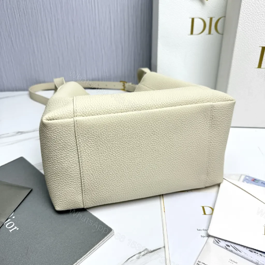 View 9 of Pebbled Leather Minimalist Bucket Bag - All-Day Luxury