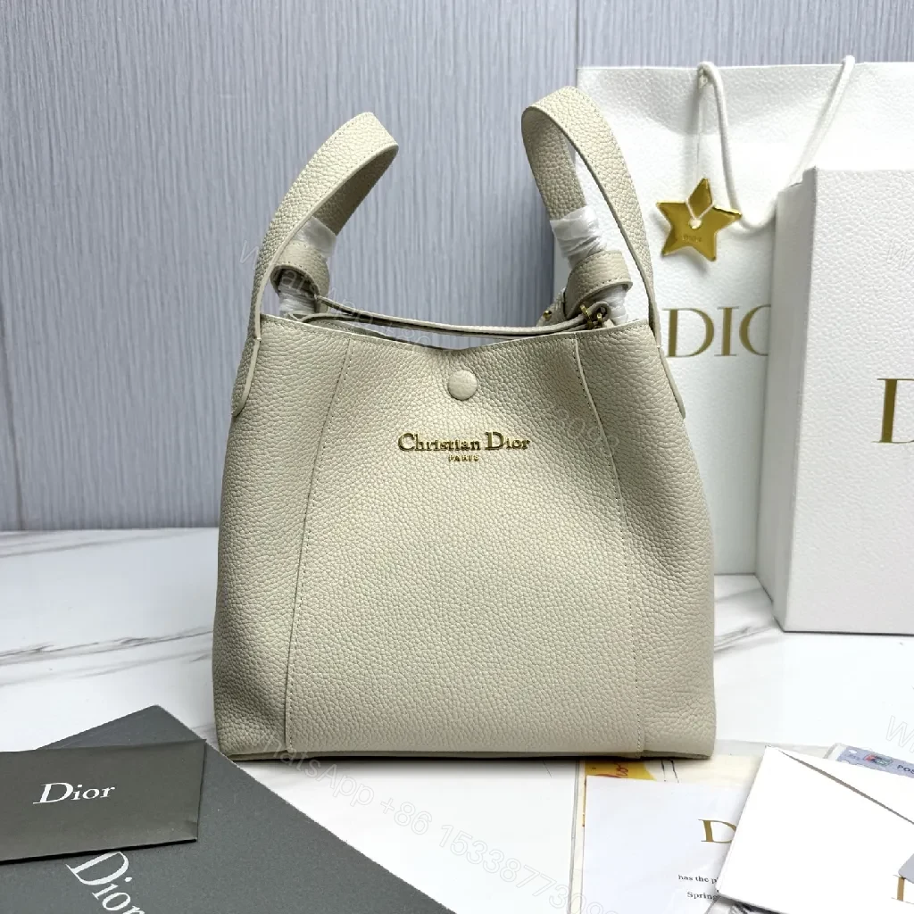 Pebbled Leather Minimalist Bucket Bag - All-Day Luxury — view 1