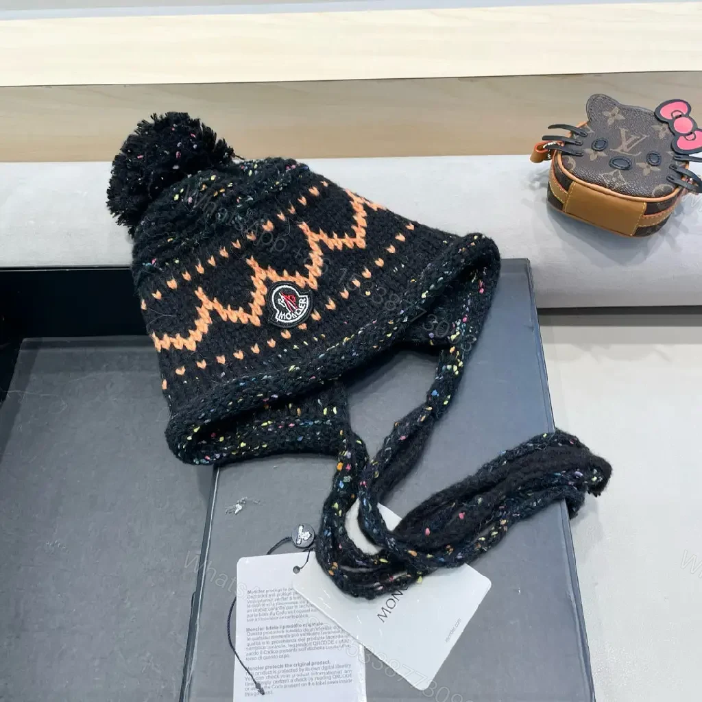 View 2 of Black Wool Earflap Beanie, Chevron Knit, Pom Pom, Signature Detail, Beanie