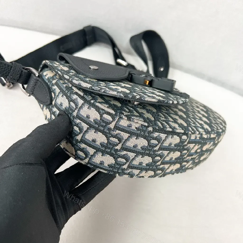 View 2 of Chic Monogram Crossbody Bag: Textured Leather, Modern Utility