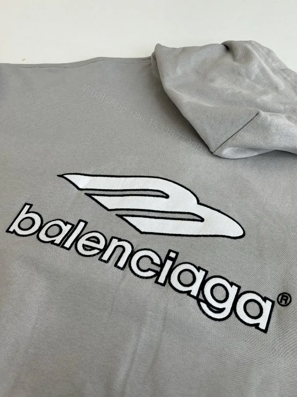 View 14 of Soft-Edge Comfort Hoodie: Graphic Branding, Oversized Streetwear