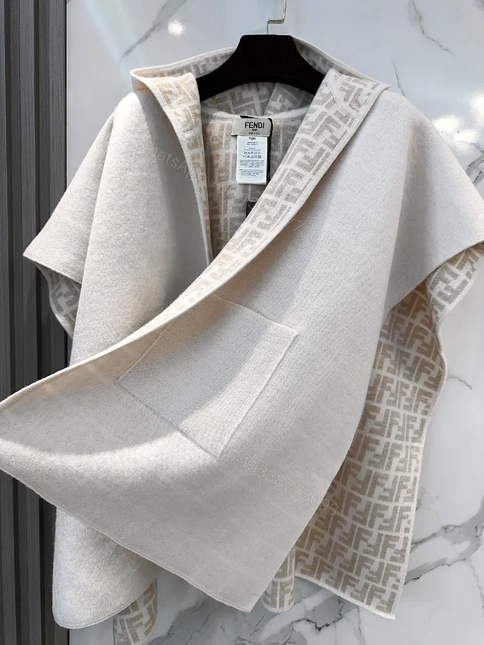 View 9 of Soft-Neutral Knit Cape Jacket: Luxury Comfort & Signature Trim