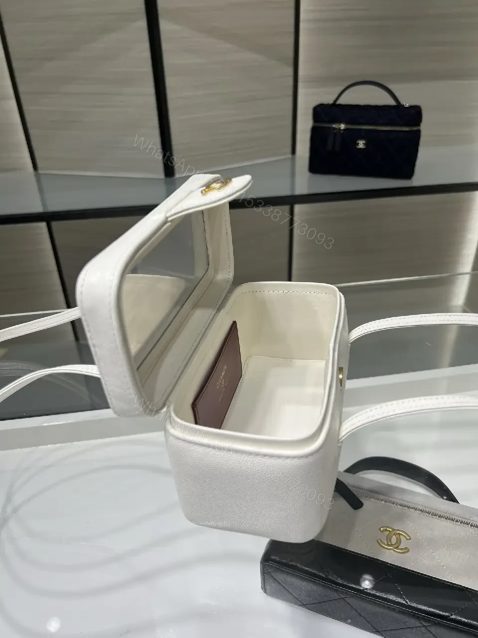 View 6 of Chic Pebbled Leather Compact Handbag - Structured, Versatile, Everyday Elegance