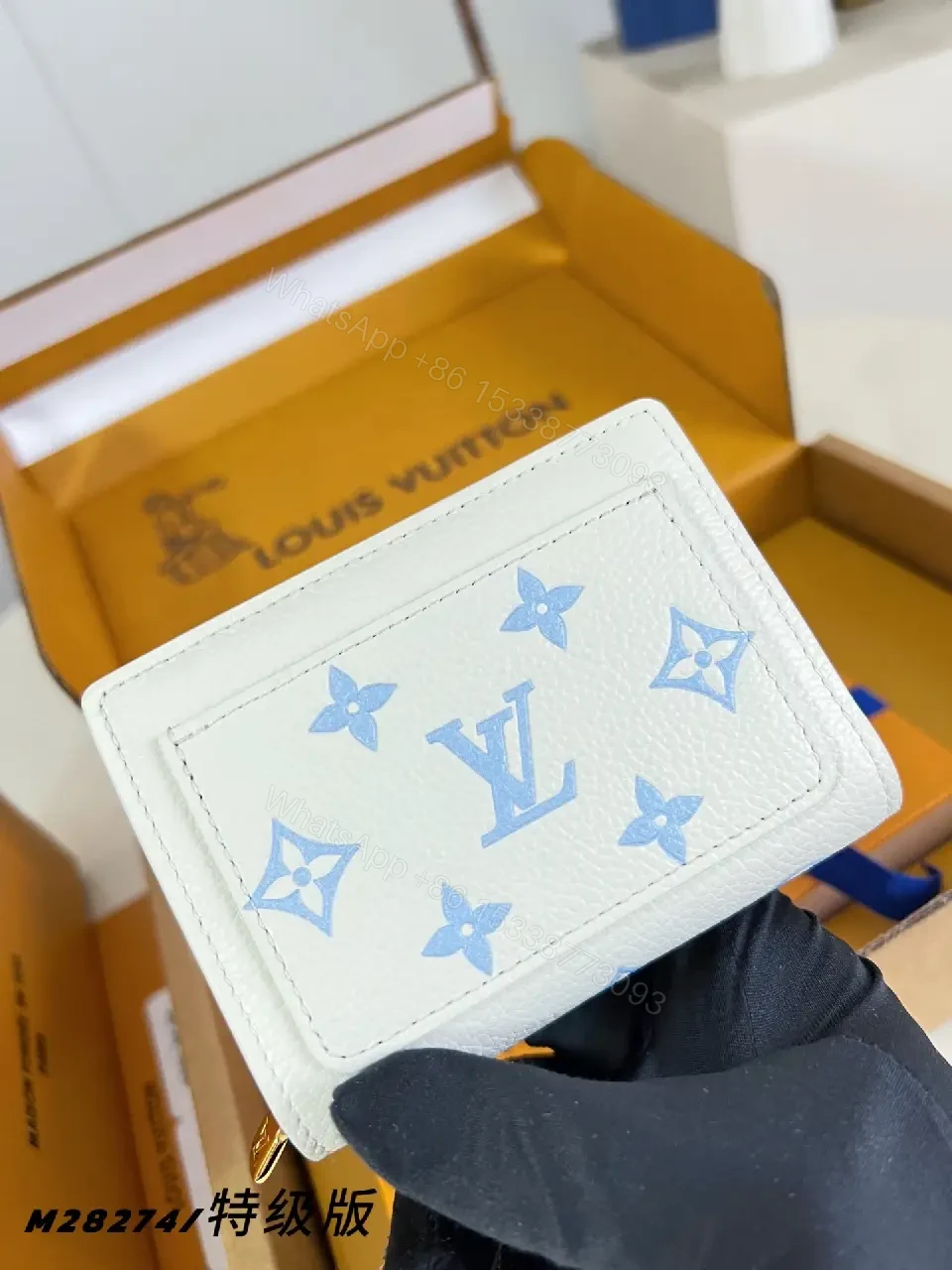 View 2 of White Pebble Leather Monogram Wallet: Slim Luxe Compact