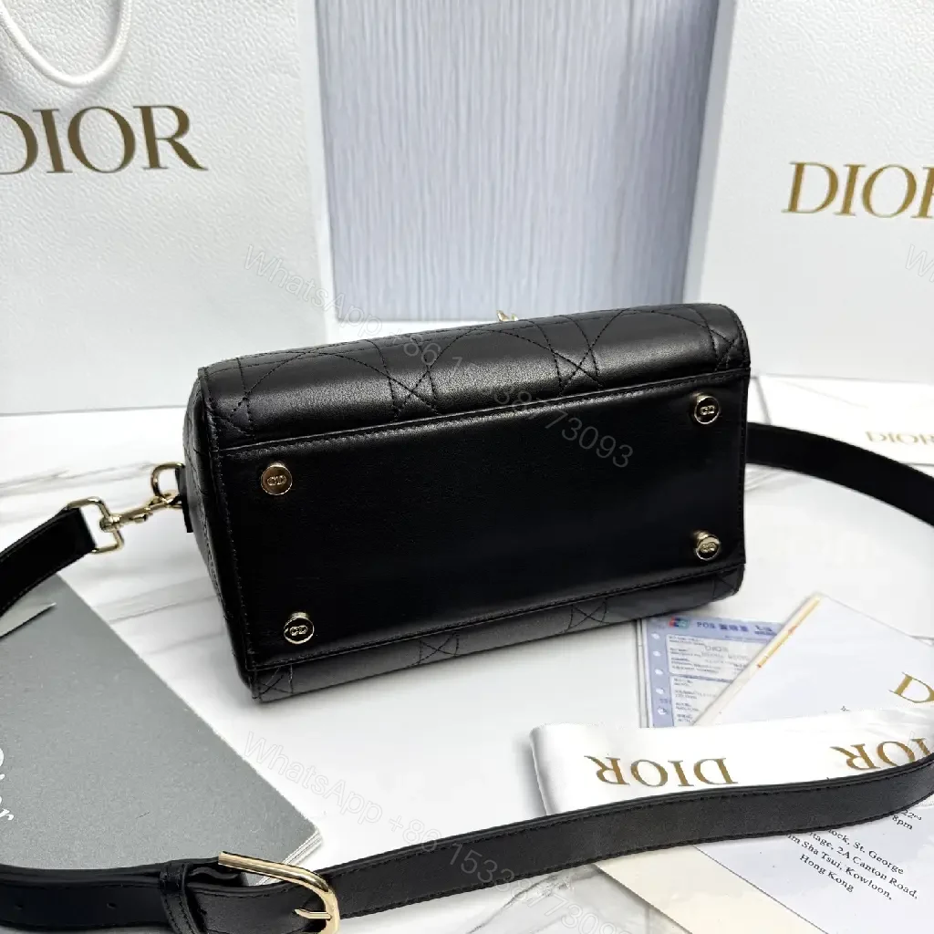 View 3 of Quilted Black Satchel: Gold Charm, Compact Luxury Bag