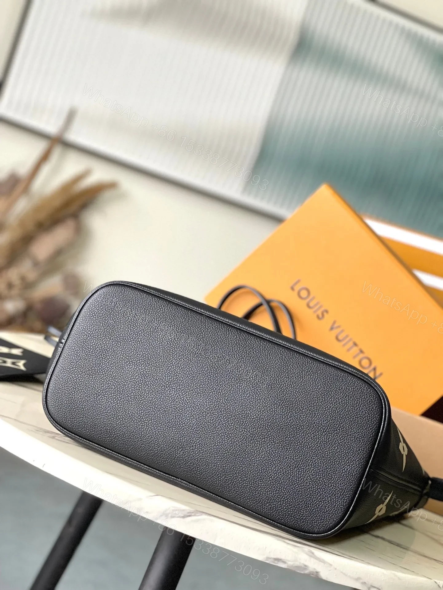View 4 of LV NEVERFULL MM IN BLACK CREAM MONOGRAM EMPREINTE LEATHER