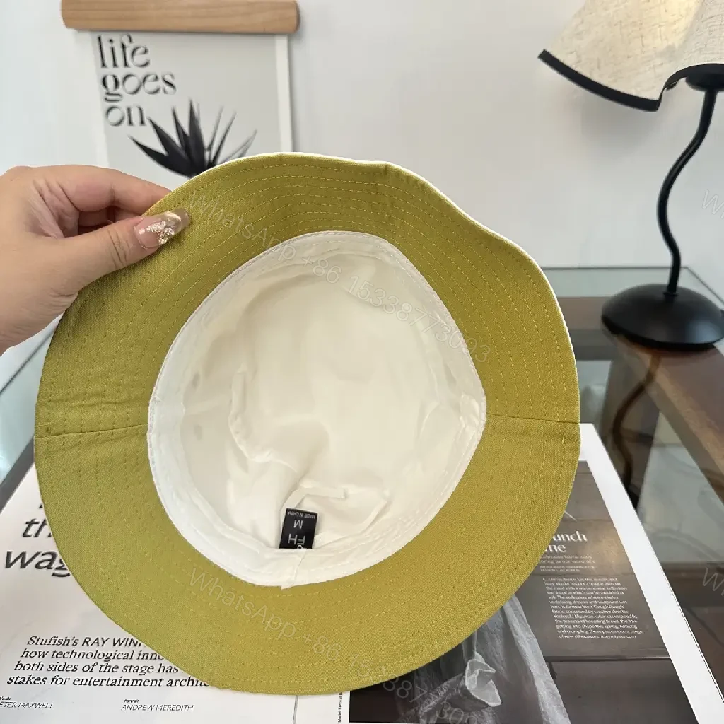 View 3 of White Bucket Hat Cotton Classic Stitch Brim, Minimal Logo Patch