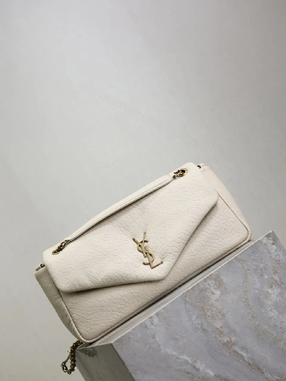View 2 of Ivory Pebbled Leather Chic Handbag with Gold Hardware