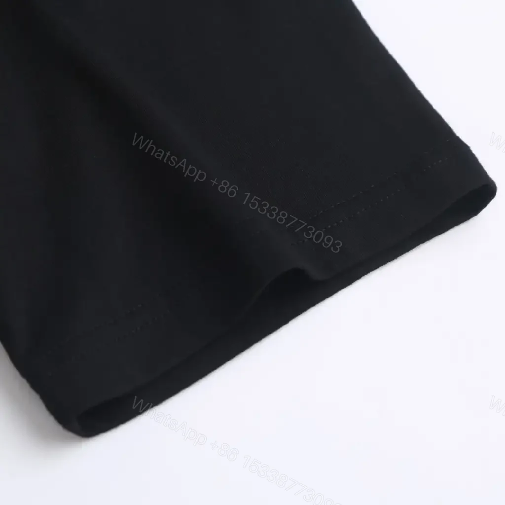 View 10 of Ice-Blue Fendi Logo Tee – Luxury Comfort, Black Cotton