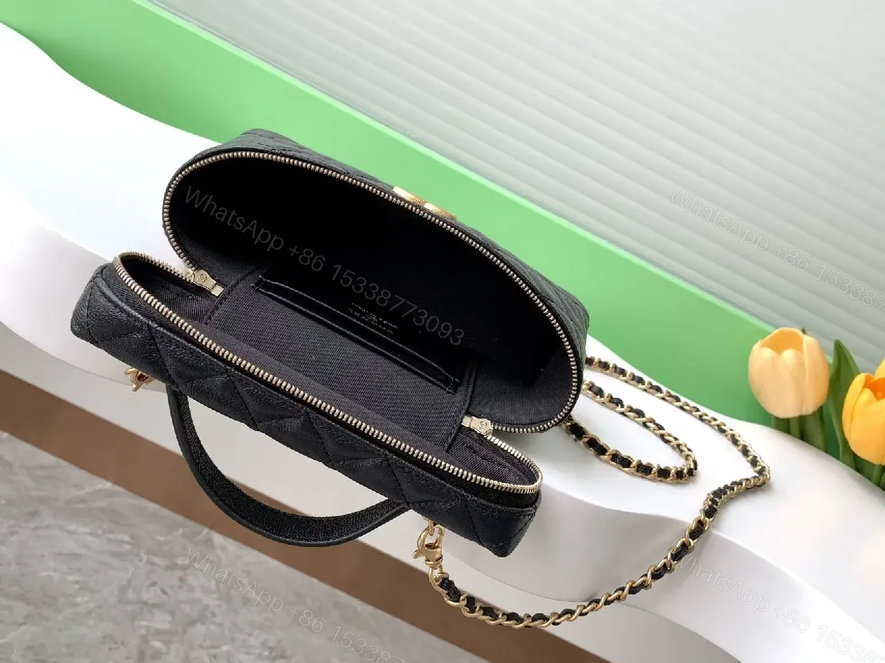View 7 of Quilted Black Bag with Gold Hardware - Chic Compact Style