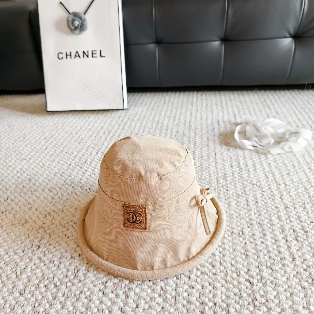 View 5 of Beige Lightweight Bucket Hat with Logo Detail
