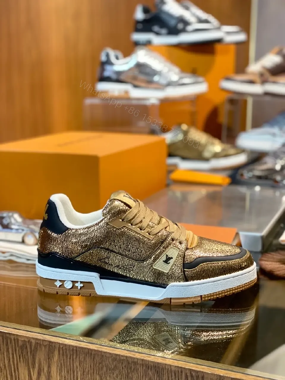View 5 of Metallic Leather High-Top Sneakers with Subtle LV Detailing