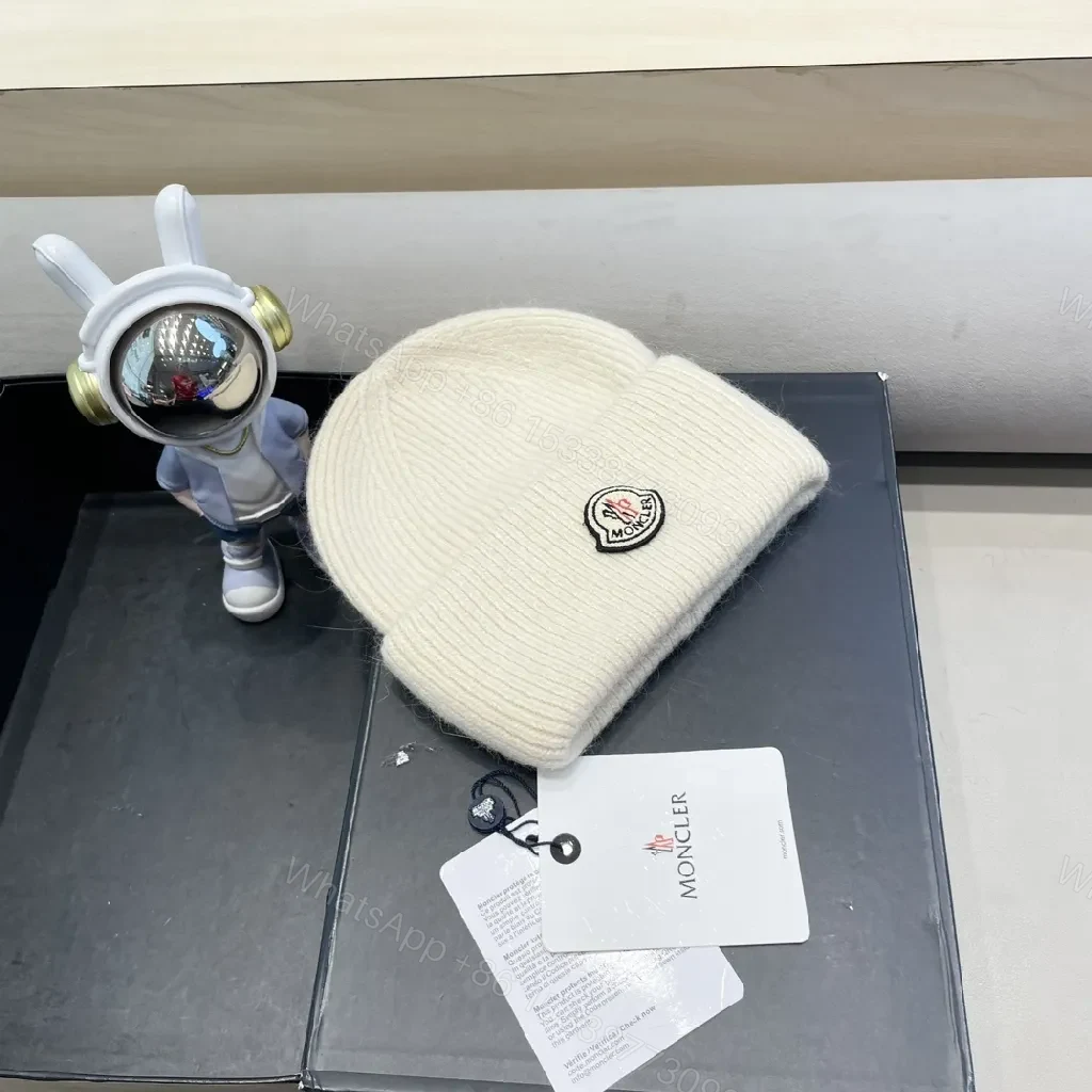 View 7 of Cozy Crest Beanie in Ivory Knit with Subtle Logo Patch
