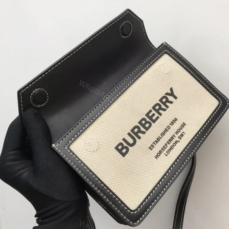 View 5 of Beige Canvas & Black Leather Crossbody: Bold Brand Duo