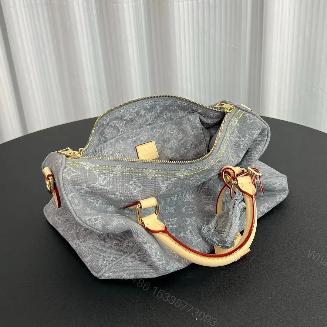 View 7 of Louis Vuitton Speedy Soft 30 bag in Monogram Denim canva