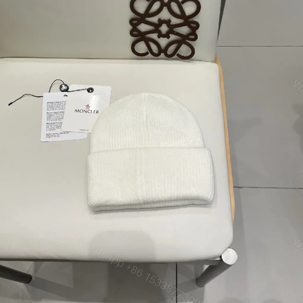 View 6 of White Knit Beanie: Ribbed Luxury, Crest Patch, All-Season