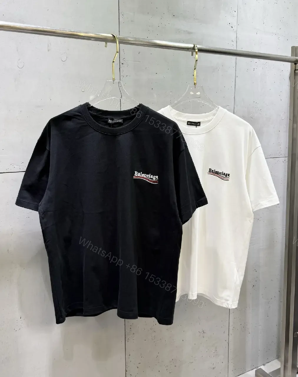 View 10 of Minimalist White Tee: Subtle Logo, Premium Cotton Short Sleeve Tee