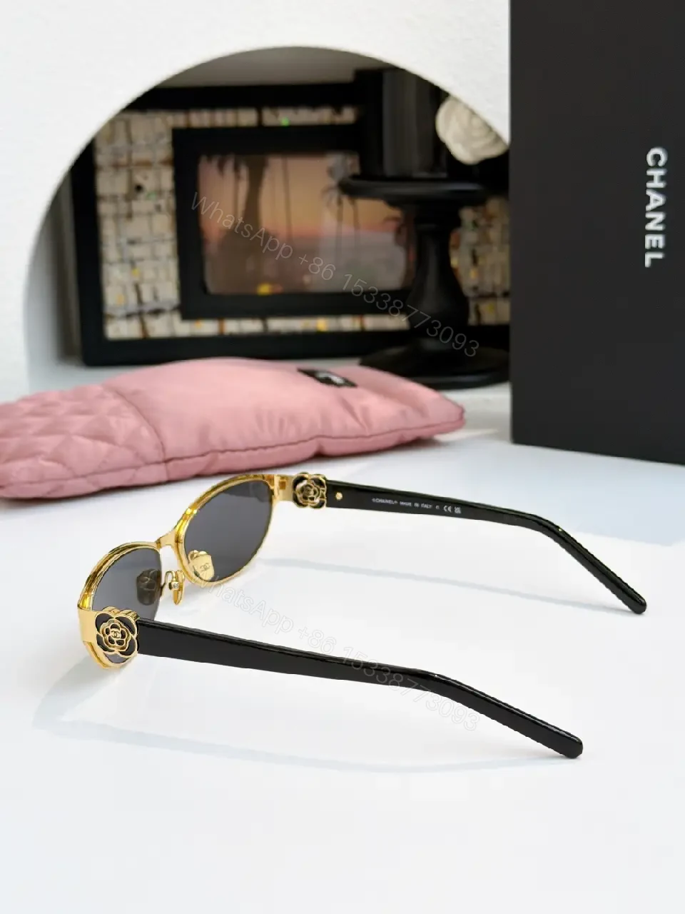View 4 of Gold Cat-Eye Sunglasses with Chanel Logo Accents