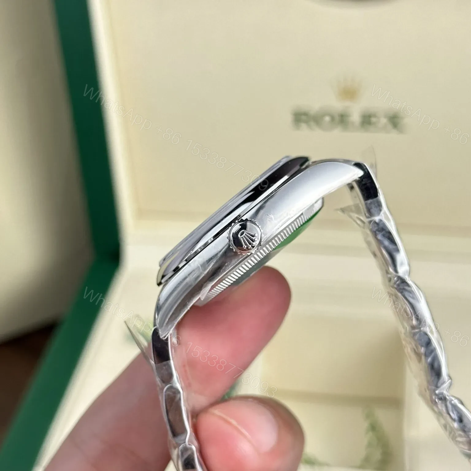 View 7 of Replica Rolex Oyster Perpetual Lady Blue Dial 126000 36 mm
