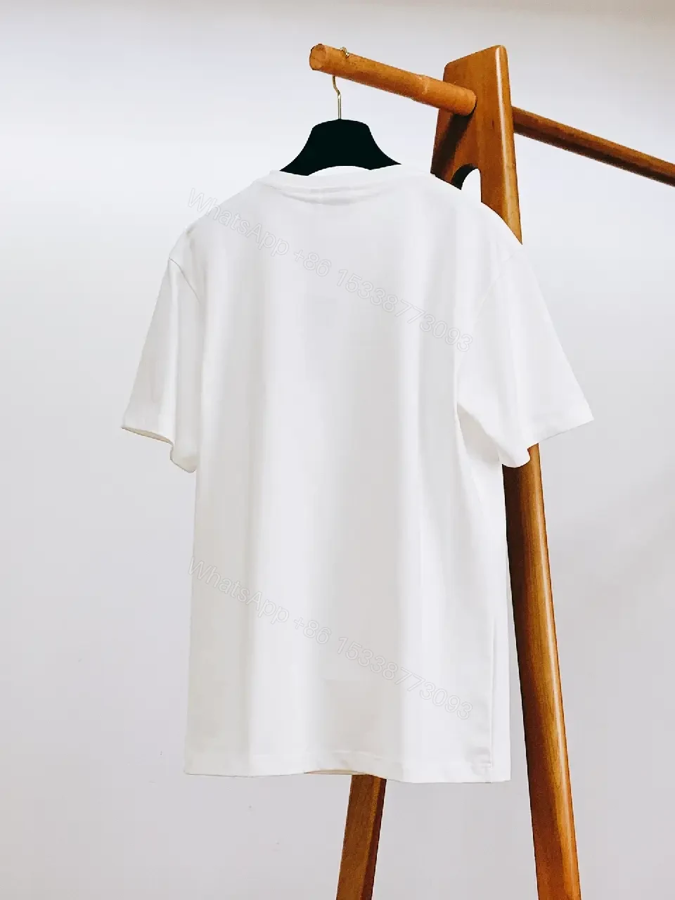 View 8 of White Cotton Tee + Subtle Logo Embellishment + Luxe Casual + Elevated Detail + T-Shirt