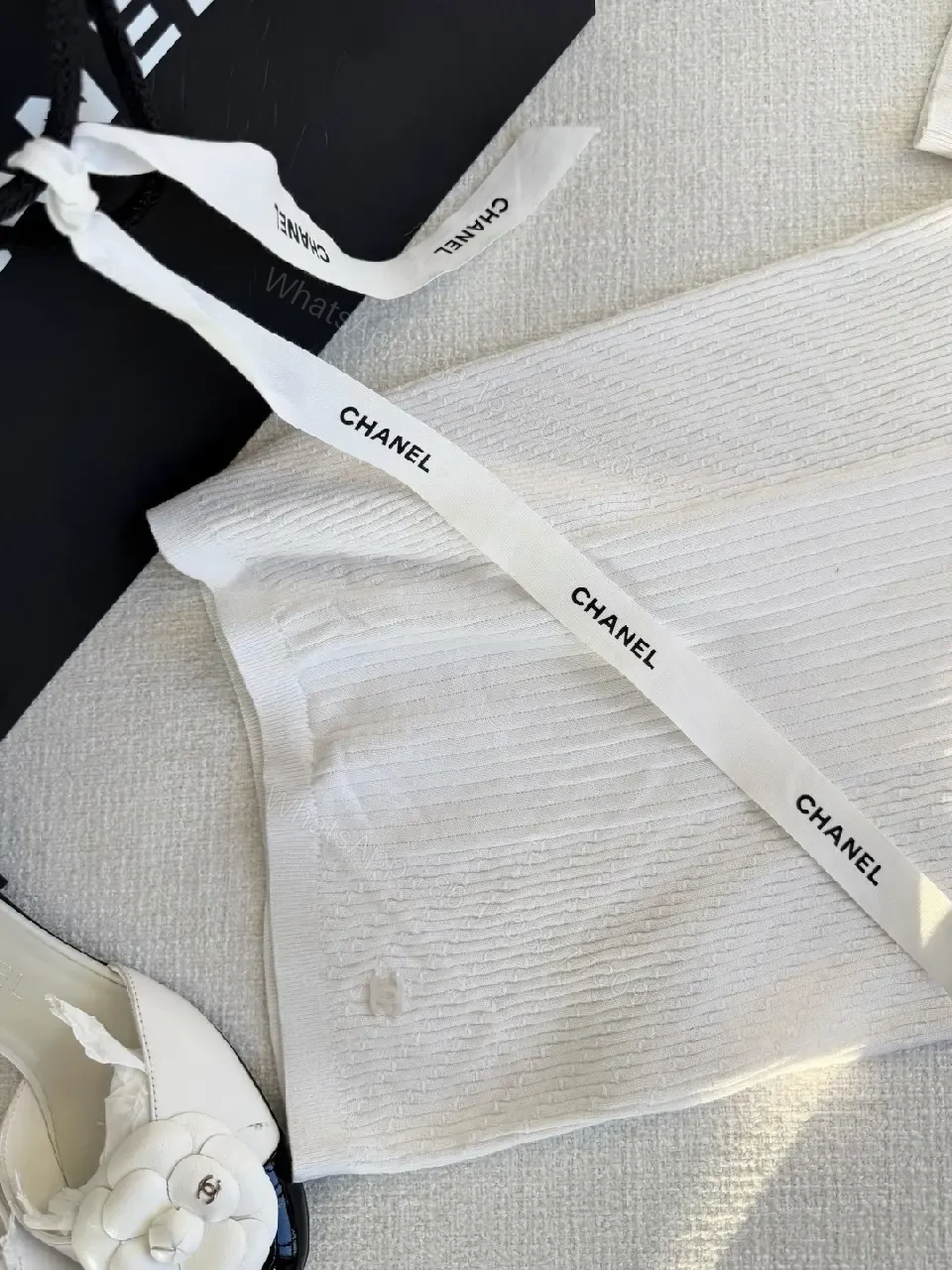 View 2 of Knit T-Shirt Dress: Subtle Emblem, Elevated Texture, All-Day Sophistication