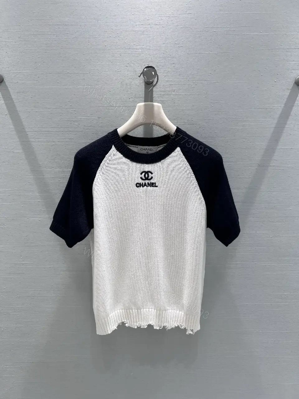 Two-Tone Knit Tee with Signature Logo Emblem - Modern Luxury Casual — view 1