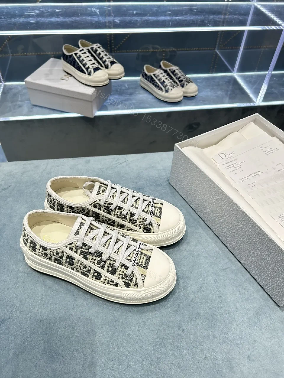View 4 of Monochrome Textured Low-Top Sneakers with Luxe Monogram Texture