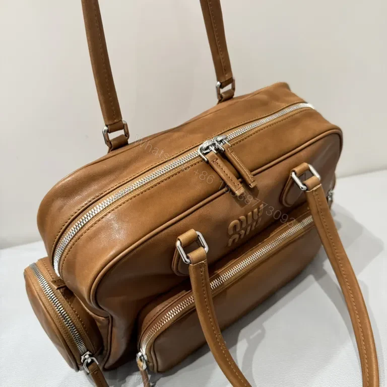 View 8 of Structured Leather Satchel: Miu MiuDetailing, Everyday Luxury