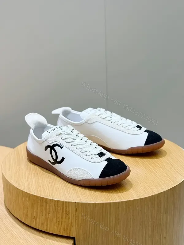 White Leather Sneaker Black Toe Classic Chanel Logo Shoes — view 1