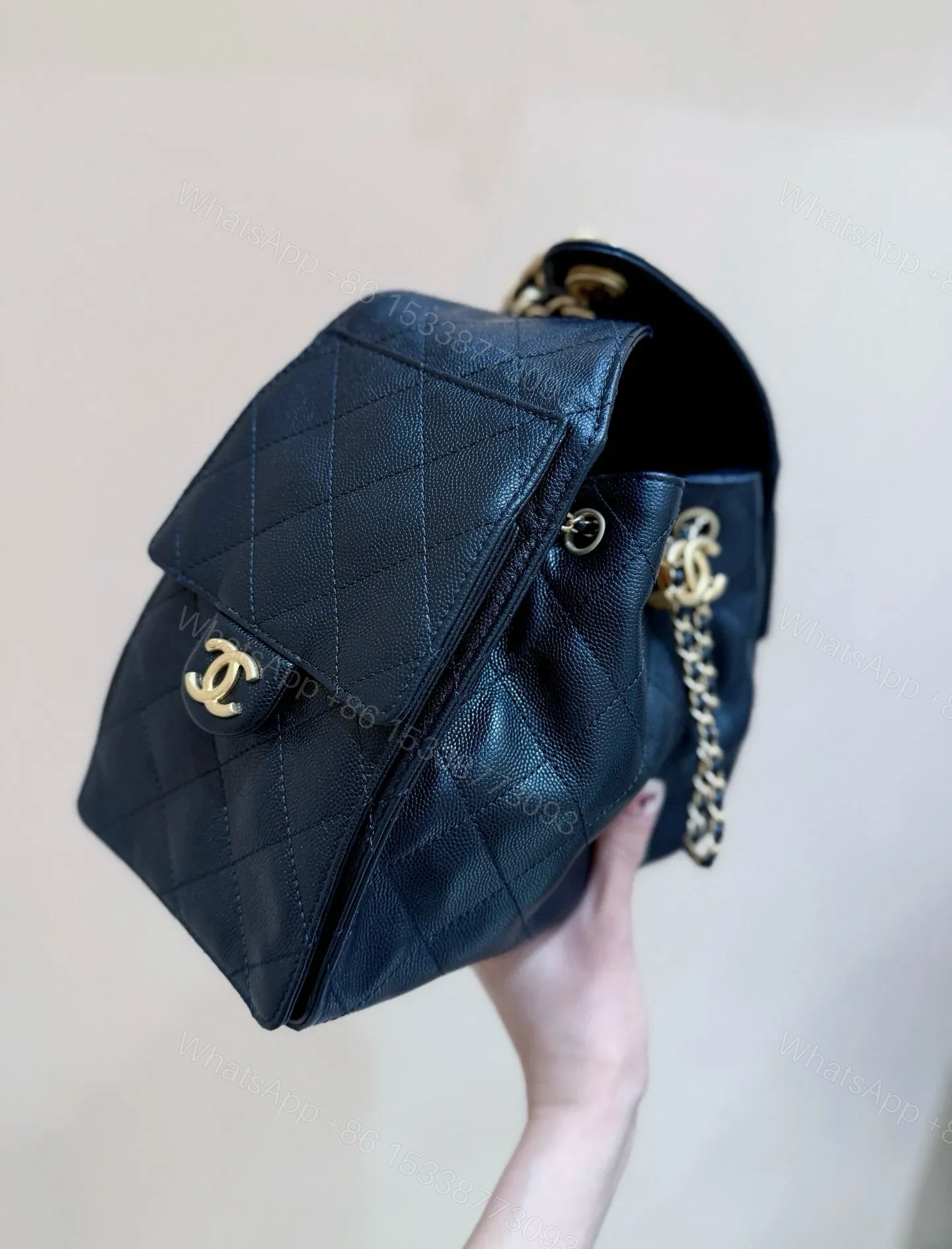 View 7 of CHANEL 25 HANDBAG IN BLACK 30 GRAINED CALFSKIN GOLD HARDWARE