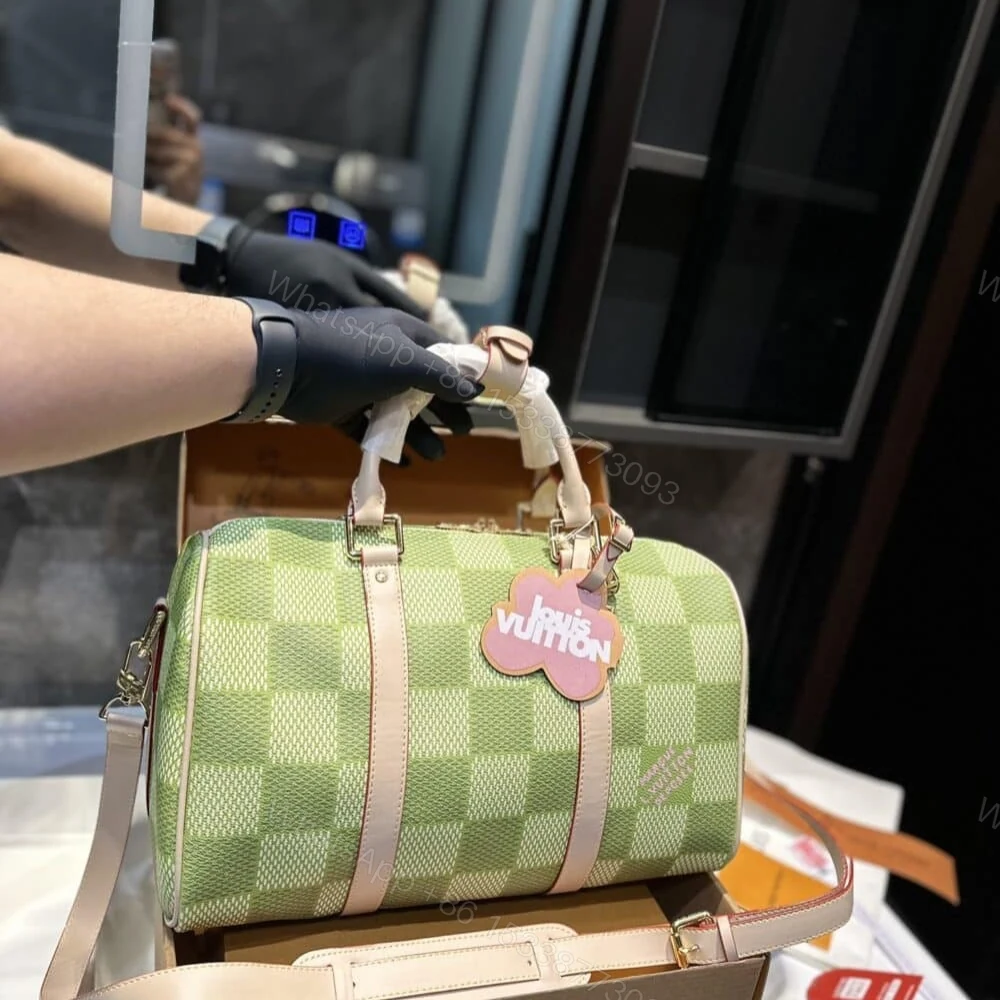 View 2 of Louis Vuitton Keepall Bandoulière Damier Canvas Green 35Cm N40671