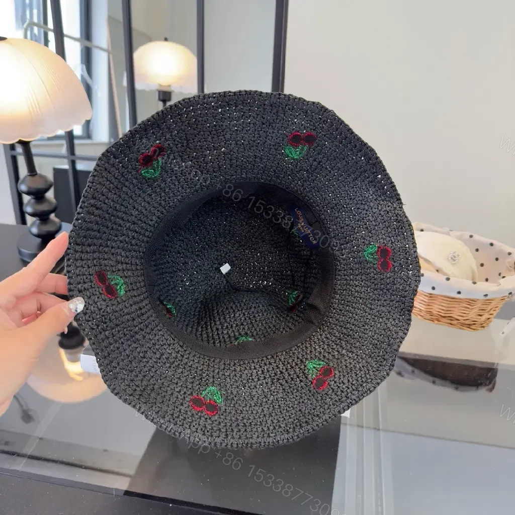 View 4 of Charcoal Crochet Bucket Hat with Cherry & LV Accent