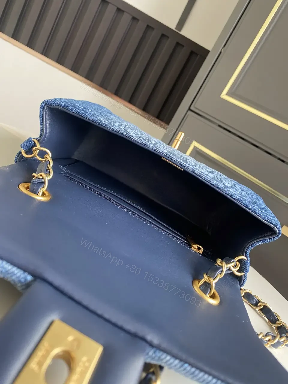 View 6 of Light Blue Denim Quilted Flap Bag with Gold CC Chain Strap
