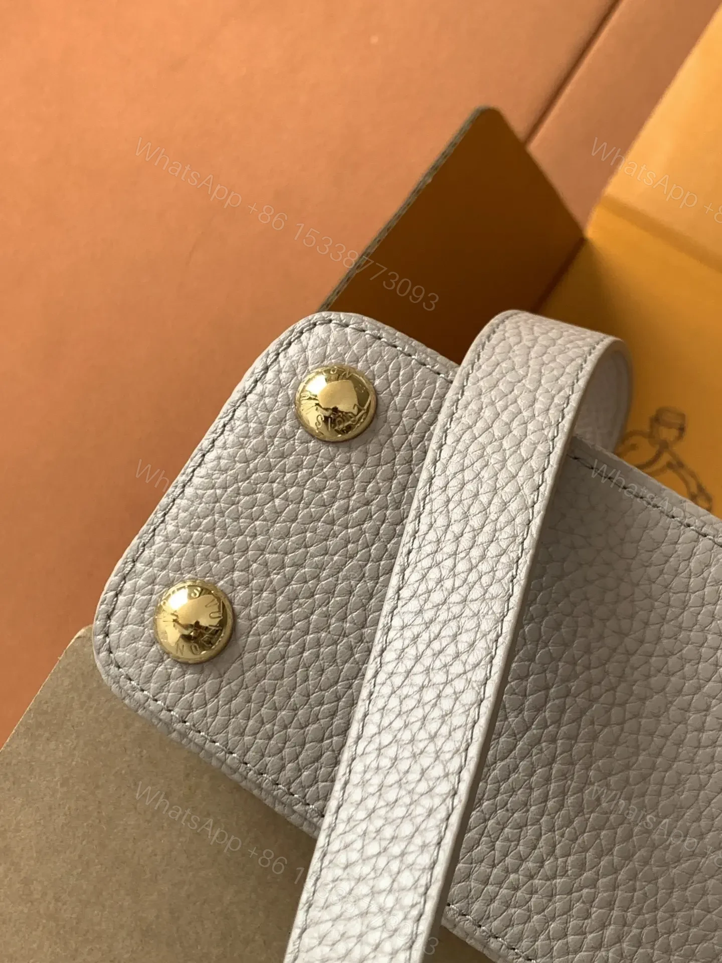 View 9 of Louis Vuitton Capucines handbag in a beige