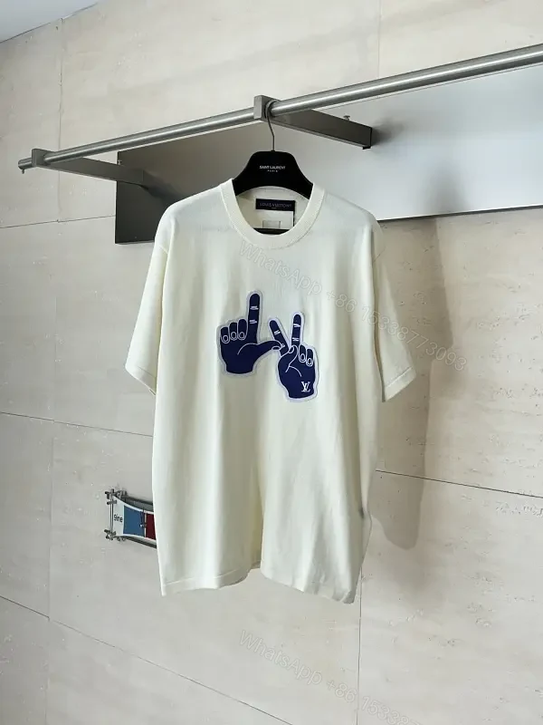 White Cotton T-Shirt, Graphic Hand Sign, Casual Style, Louis Vuitton Accent — view 1