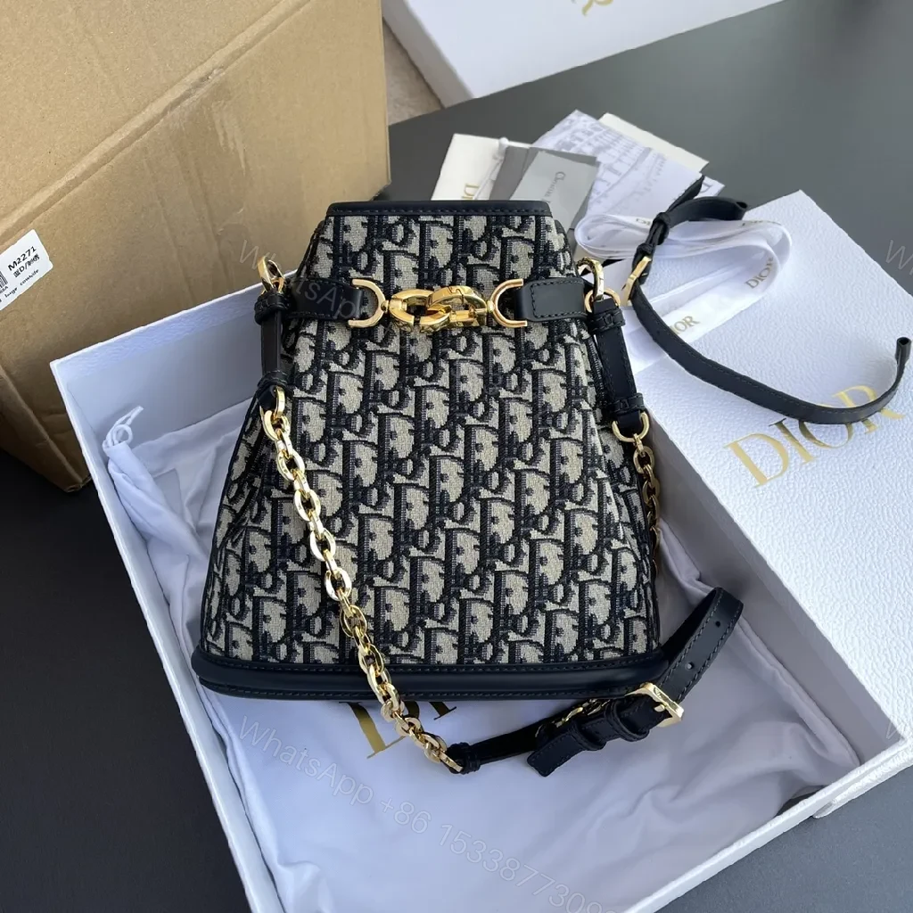 View 3 of Structured Classic Monogram Canvas Bucket Bag with Gold Hardware