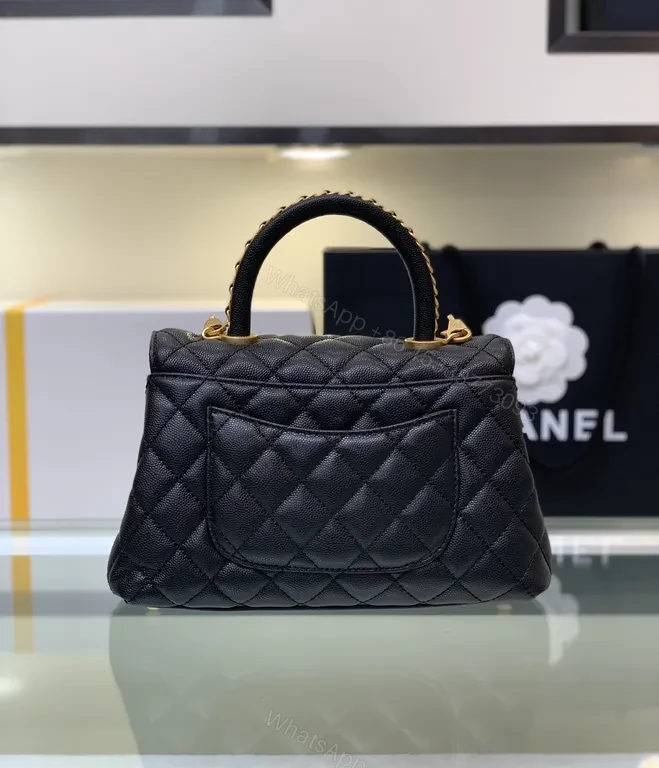 View 5 of Chic Quilted Black Handbag with Gold Twist â€” All-Day Comfort
