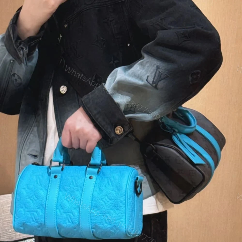 View 8 of Louis Vuitton Keepall Bandoulière 25 Turquoise 25Cm M11996