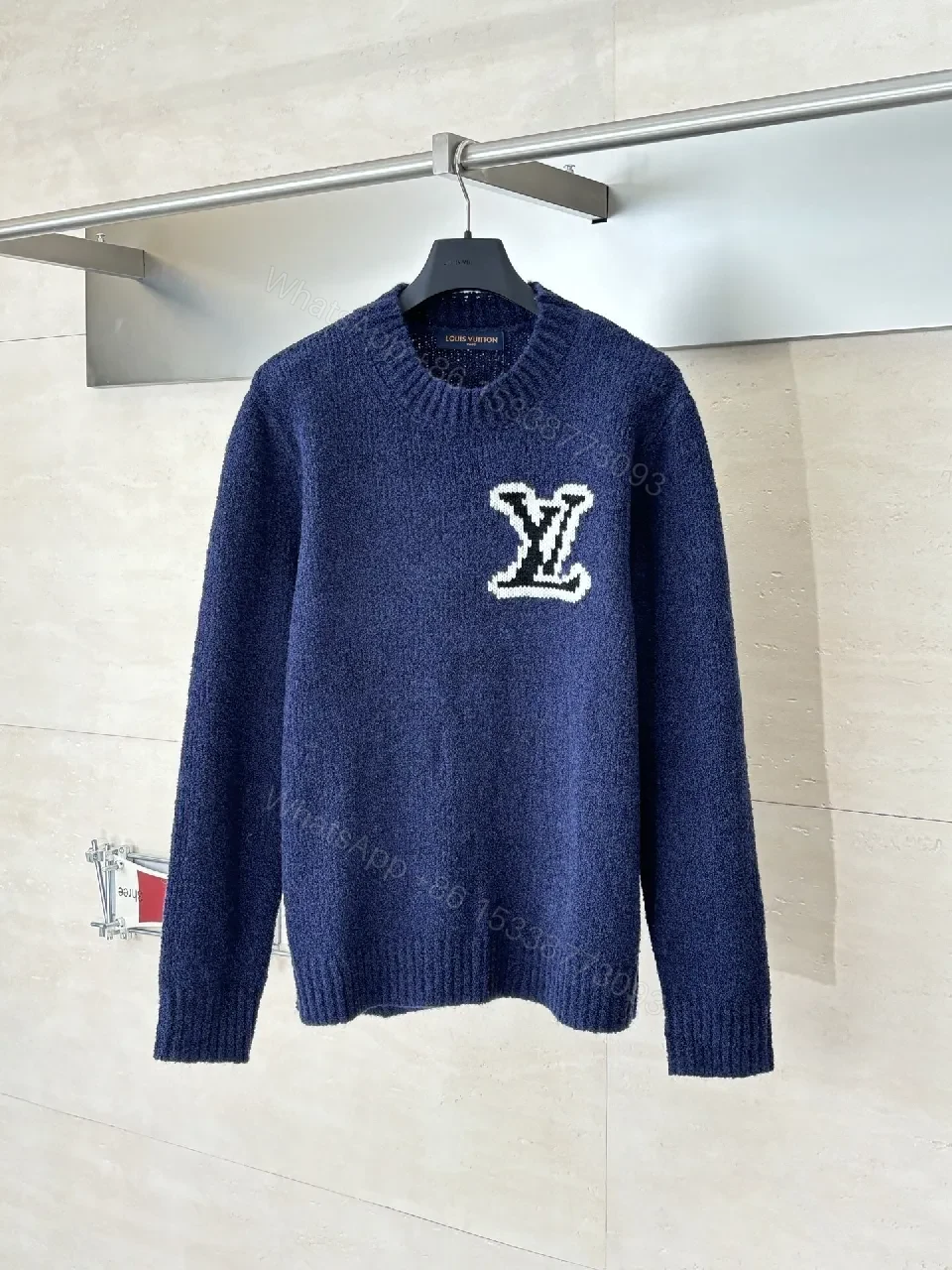 Blue Knit Luxury Sweater with Signature Monogram Emblem — view 1