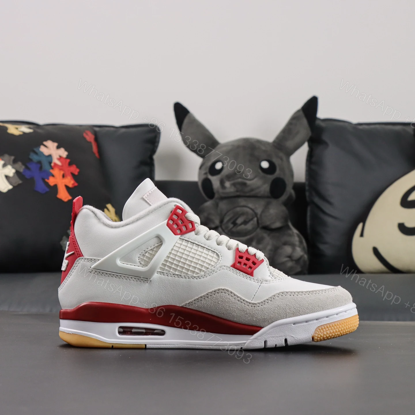 View 2 of Nike SB x Air Jordan 4 Retro SP “Varsity Red” Reps
