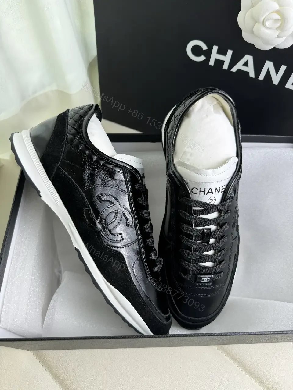 View 9 of Chic Black Leather Trainer — Luxury Comfort, Subtle Logo