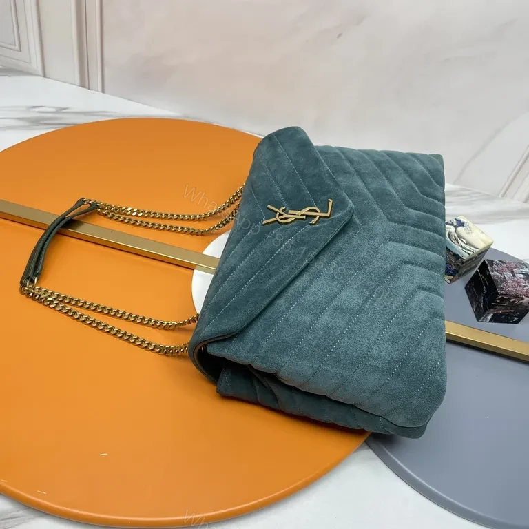 View 7 of Chic Teal Suede Quilted Shoulder Bag with Gold Monogram