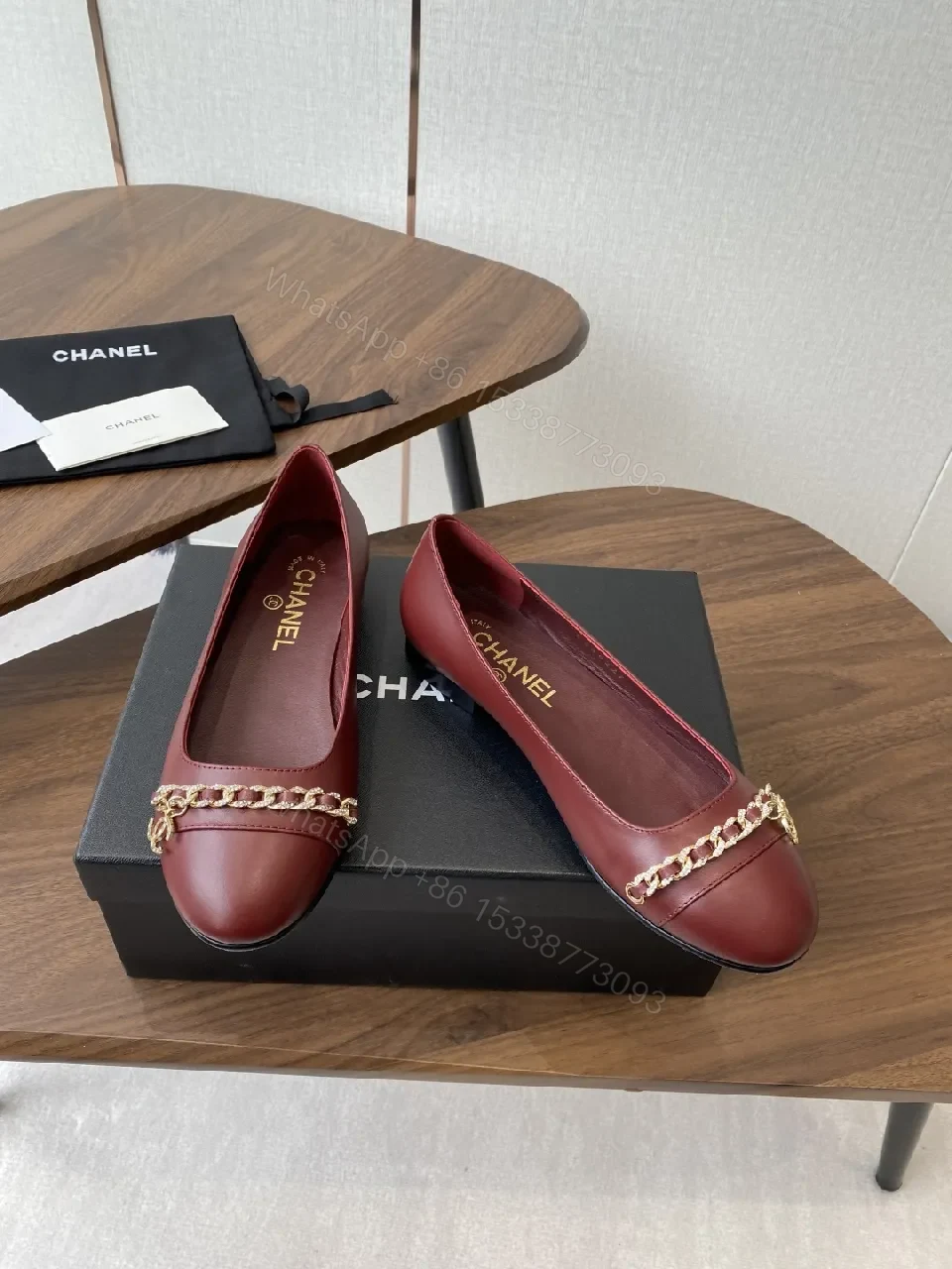 View 9 of Burgundy Leather Flats with Gold Chain Detail - Everyday Luxury