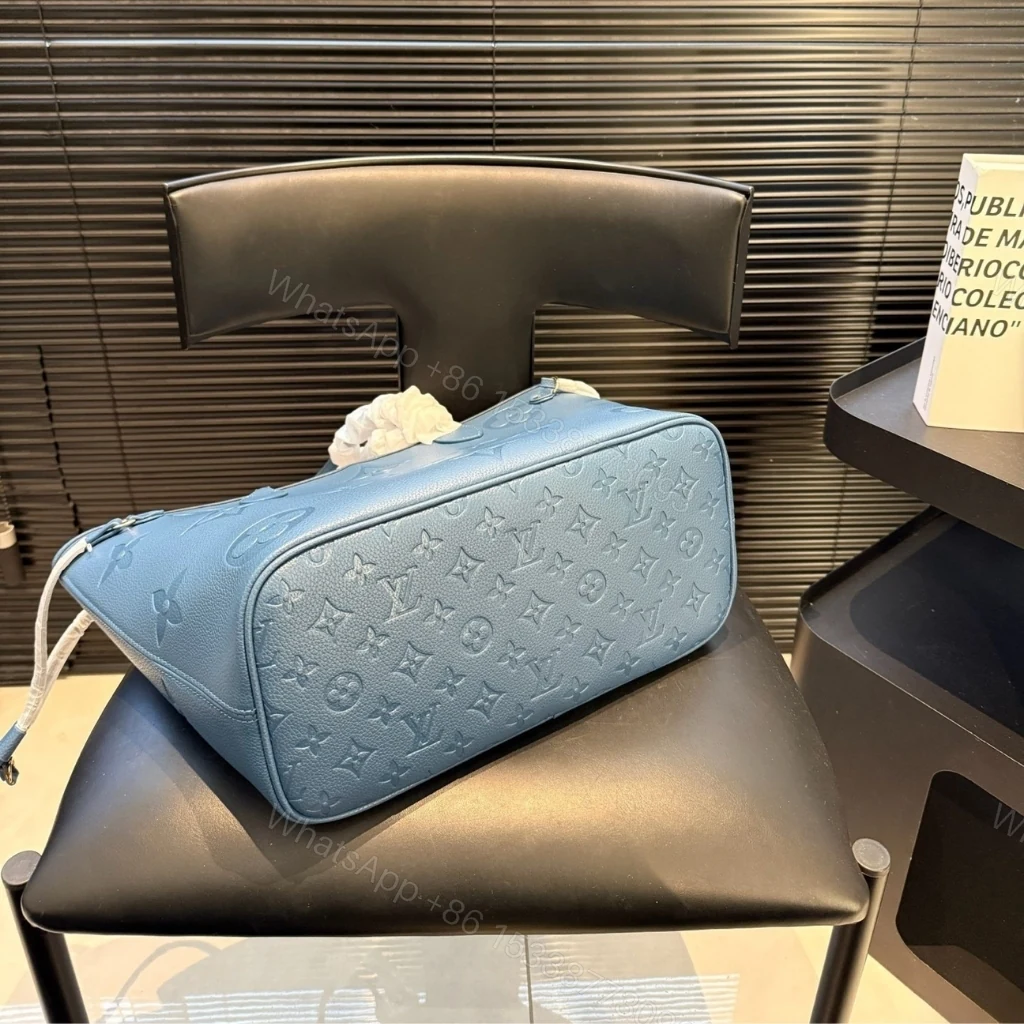 View 5 of Louis Vuitton Neverfull MM Tote Bag Monogram Empreinte Bleu Jean 31cm M27358