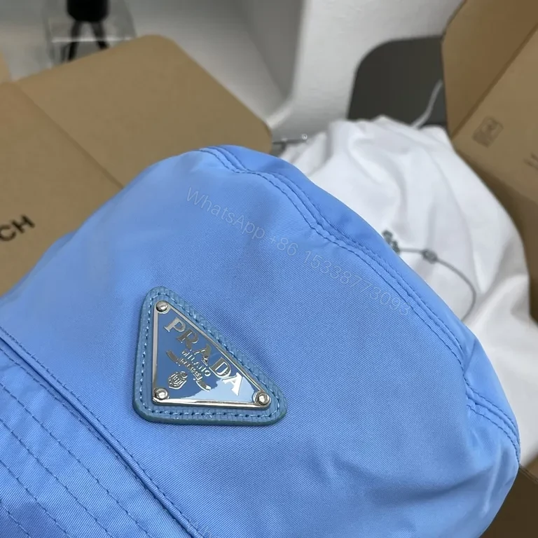 View 6 of Blue Prada Bucket Hat: Luxe Nylon, Sun-Protection, Packable